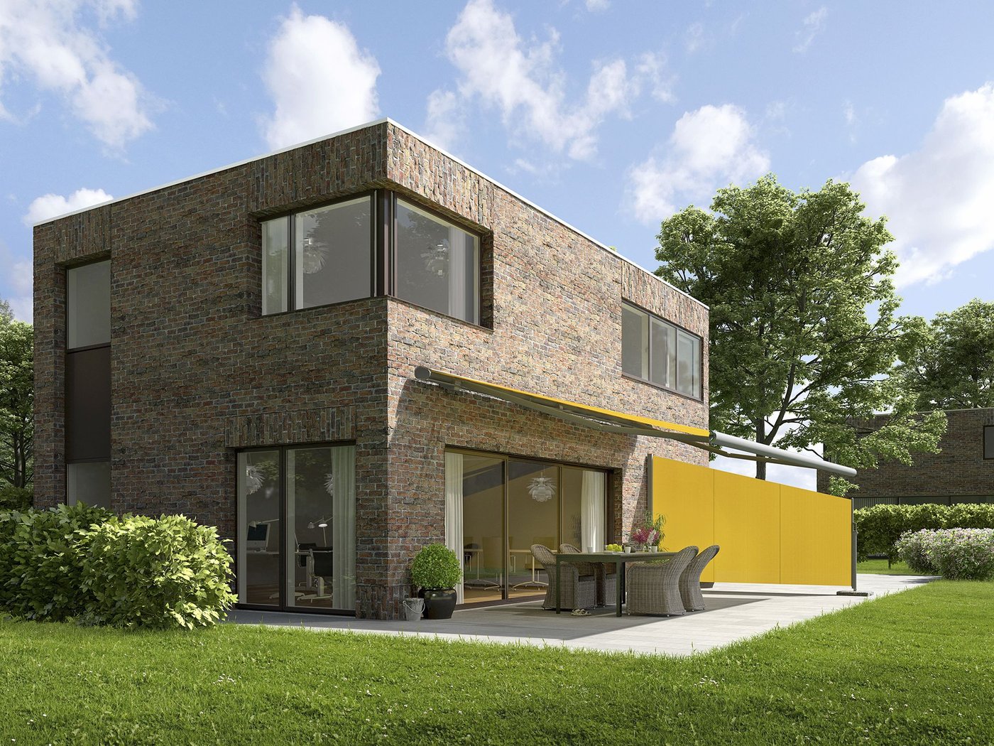 Forlænget MX-790 markise med gul dug og grå ramme på et moderne hus